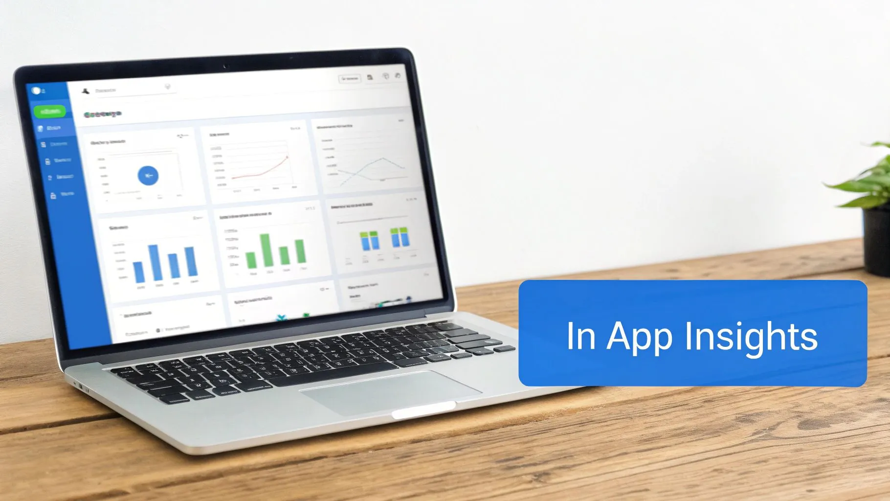 A laptop screen displays a business intelligence dashboard with graphs and 'In App Insights' text.