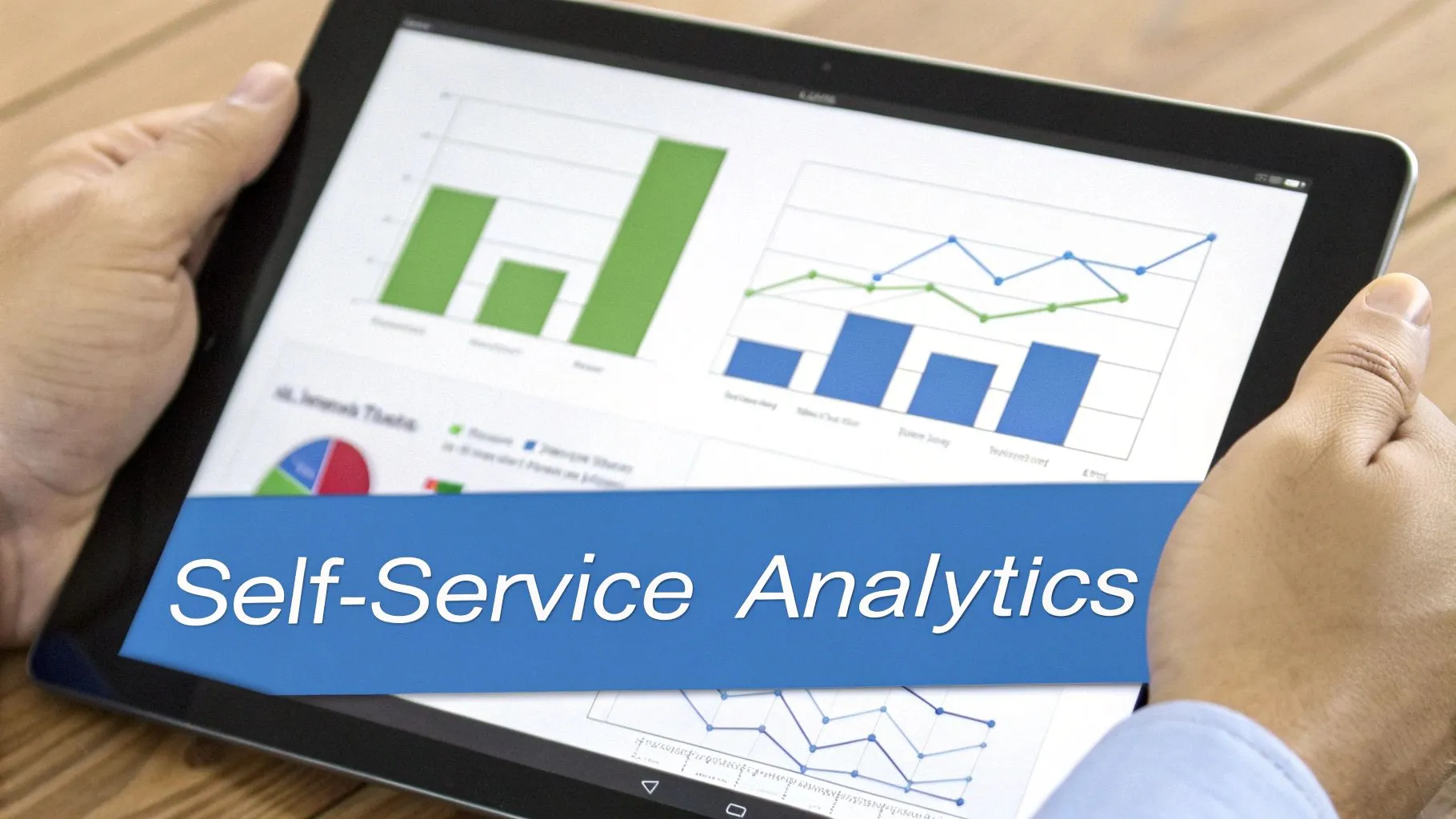 A person holds a tablet displaying business analytics charts, graphs, and 'Self-Service Analytics' text.